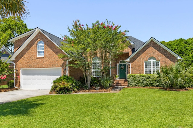 1441 Waterside Ct, Mount Pleasant, SC 29464 - traditional-style house with brick siding, a front yard, concrete driveway, and a garage