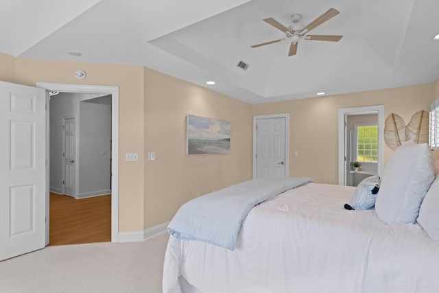 1441 Waterside Ct, Mount Pleasant, SC 29464 - bedroom with a tray ceiling, carpet floors, recessed lighting, and a ceiling fan