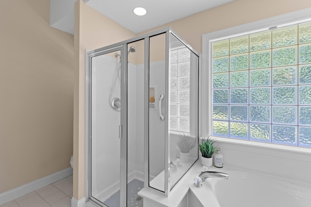 1441 Waterside Ct, Mount Pleasant, SC 29464 - bathroom featuring a stall shower, a bath, and tile patterned floors