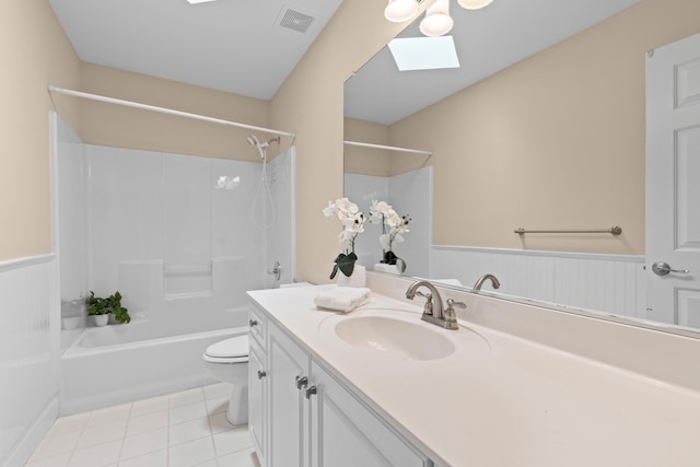 1441 Waterside Ct, Mount Pleasant, SC 29464 - full bathroom featuring a skylight, vanity, a wainscoted wall, shower / washtub combination, and tile patterned flooring