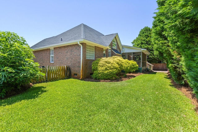 1441 Waterside Ct, Mount Pleasant, SC 29464 - view of home's exterior with a sunroom, brick siding, crawl space, and roof with shingles