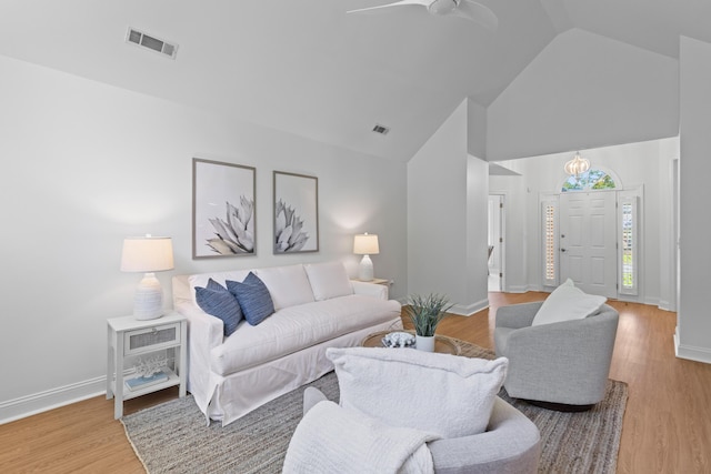 1441 Waterside Ct, Mount Pleasant, SC 29464 - living room with high vaulted ceiling, wood finished floors, and ceiling fan