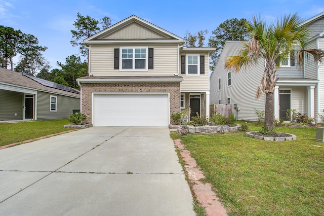 view of front of house with a garage and a front lawn