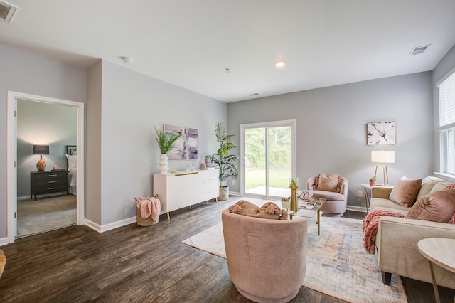 living room featuring dark hardwood / wood-style flooring