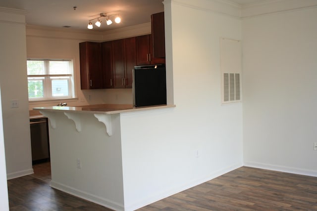 1755 Central Park Rd Unit 9103, Charleston, SC 29412 - kitchen featuring freestanding refrigerator, a kitchen breakfast bar, dark wood finished floors, ornamental molding, and light countertops