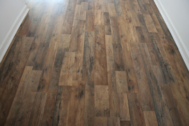 1755 Central Park Rd Unit 9103, Charleston, SC 29412 - detailed view of wood finished floors and baseboards