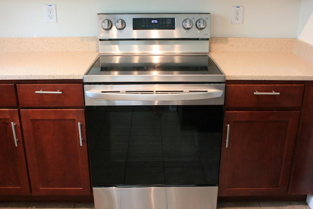 1755 Central Park Rd Unit 9103, Charleston, SC 29412 - kitchen with stainless steel electric range oven and light tile patterned flooring