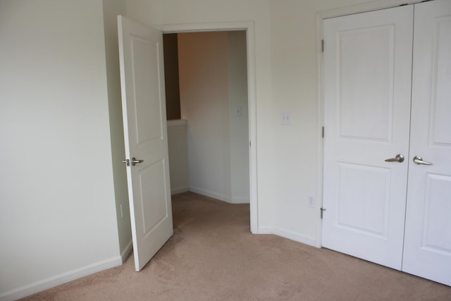 1755 Central Park Rd Unit 9103, Charleston, SC 29412 - unfurnished bedroom with light colored carpet, baseboards, and a closet