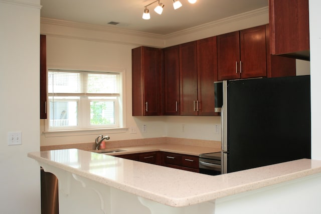 1755 Central Park Rd Unit 9103, Charleston, SC 29412 - kitchen featuring stainless steel appliances, a sink, light stone counters, a breakfast bar, and crown molding