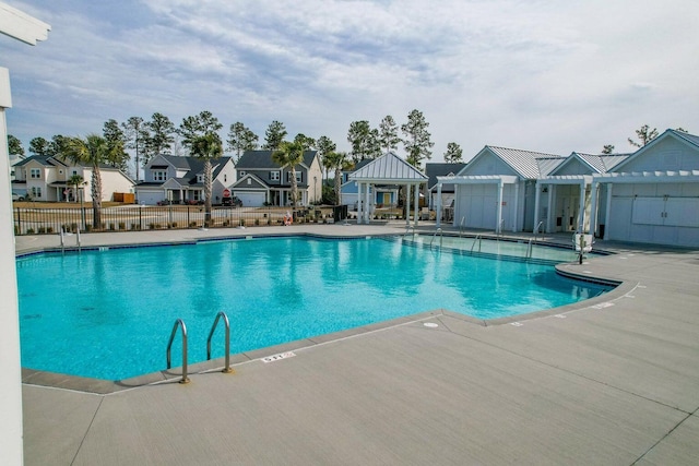 view of pool with a patio and a gazebo