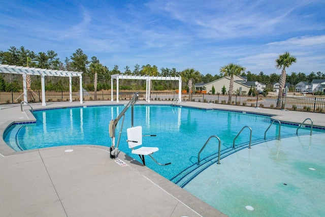 view of pool with a pergola