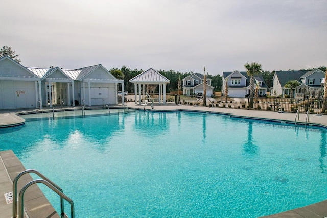 view of pool with a gazebo and a patio