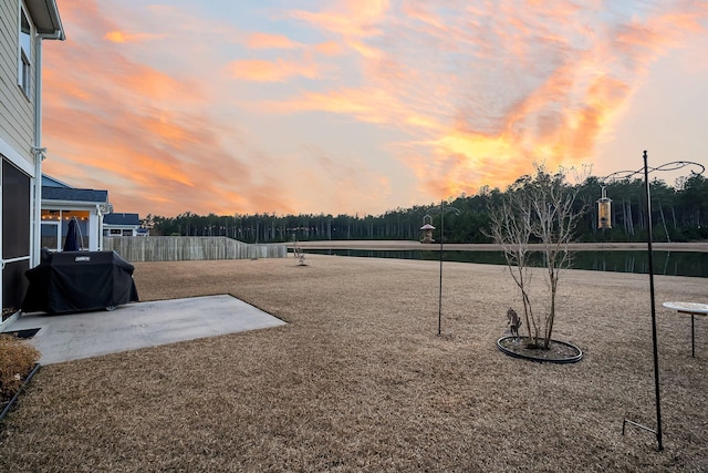 surrounding community featuring a patio area