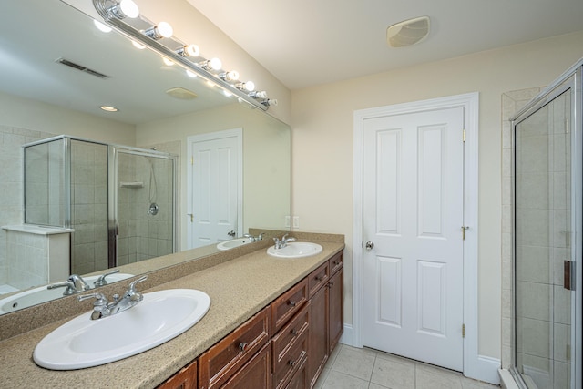 3005 Macbeth Creek Dr, Charleston, SC 29414 - bathroom featuring double vanity, a stall shower, and tile patterned flooring