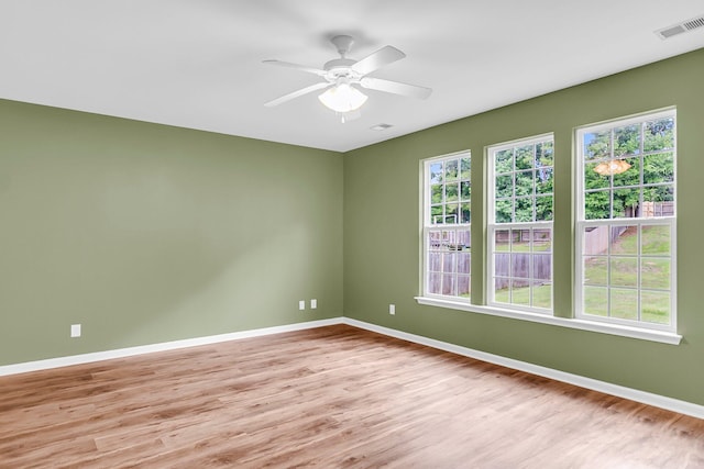 127 Rawlins Dr, Summerville, SC 29485 - empty room featuring light wood-style flooring and a ceiling fan