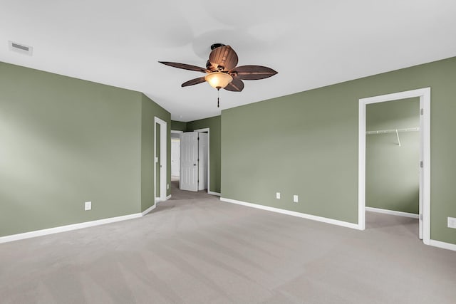 127 Rawlins Dr, Summerville, SC 29485 - unfurnished bedroom with carpet floors, a ceiling fan, and a walk in closet