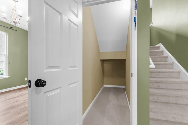 127 Rawlins Dr, Summerville, SC 29485 - staircase with a chandelier and baseboards