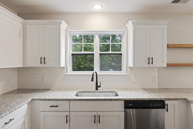 1506 Southwick Dr, Johns Island, SC 29455 - kitchen with stainless steel dishwasher, a sink, open shelves, white cabinetry, and recessed lighting