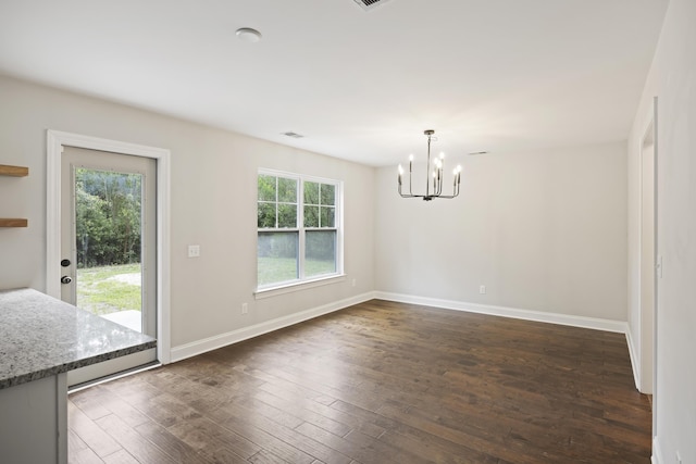1506 Southwick Dr, Johns Island, SC 29455 - unfurnished dining area featuring a chandelier, dark wood finished floors, and baseboards