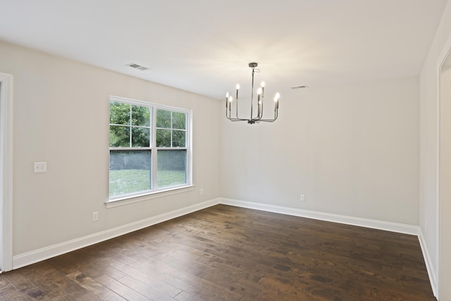 1506 Southwick Dr, Johns Island, SC 29455 - empty room with a chandelier, dark wood-style flooring, and baseboards