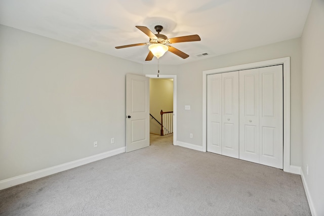 1506 Southwick Dr, Johns Island, SC 29455 - unfurnished bedroom with carpet floors, baseboards, a closet, and a ceiling fan