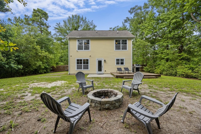 1506 Southwick Dr, Johns Island, SC 29455 - back of property featuring an outdoor fire pit and a deck