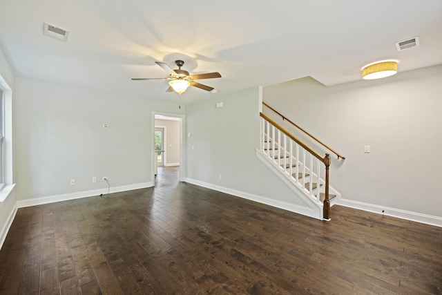1506 Southwick Dr, Johns Island, SC 29455 - unfurnished living room featuring ceiling fan, dark wood-style flooring, stairway, and baseboards
