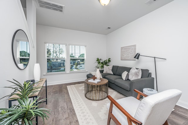 living room featuring dark hardwood / wood-style floors