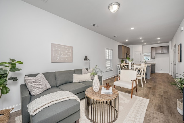 living room with hardwood / wood-style flooring