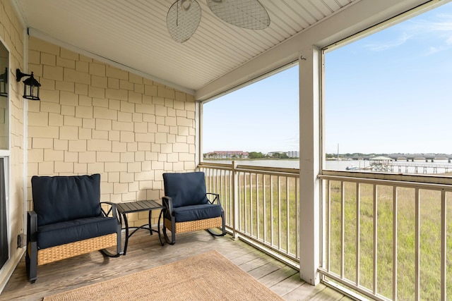 116 W 2nd St, Folly Beach, SC 29439 - sunroom with a water view, ceiling fan, and vaulted ceiling