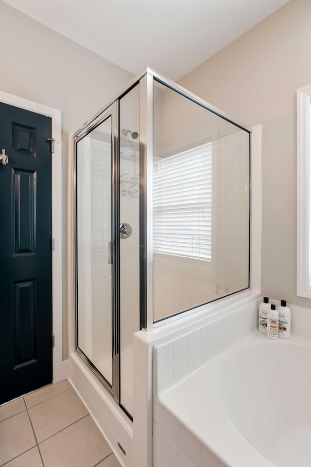 116 W 2nd St, Folly Beach, SC 29439 - bathroom with a shower stall, a garden tub, and tile patterned floors