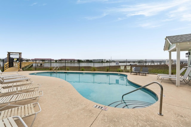 116 W 2nd St, Folly Beach, SC 29439 - community pool featuring a patio and fence