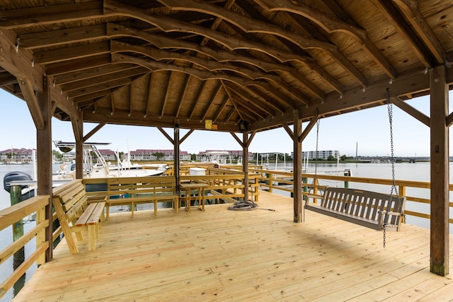 116 W 2nd St, Folly Beach, SC 29439 - wooden deck with a water view