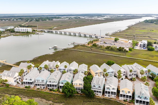 116 W 2nd St, Folly Beach, SC 29439 - aerial perspective of suburban area with a nearby body of water and a notable bridge