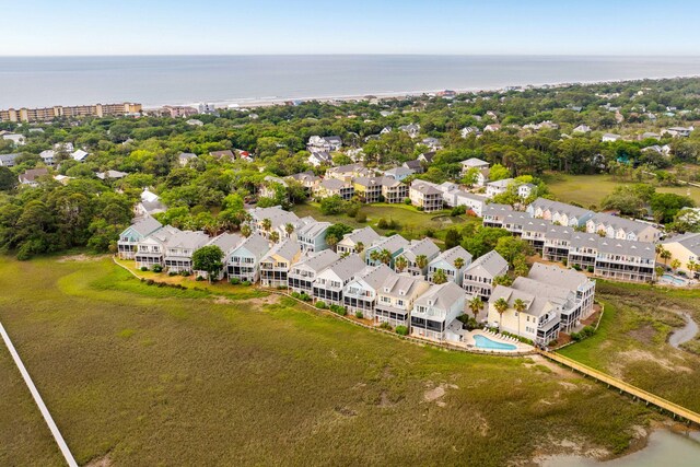 116 W 2nd St, Folly Beach, SC 29439 - aerial perspective of suburban area featuring a pool and a nearby body of water