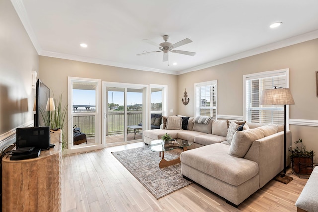 116 W 2nd St, Folly Beach, SC 29439 - living room featuring ceiling fan, light wood-style flooring, crown molding, and recessed lighting