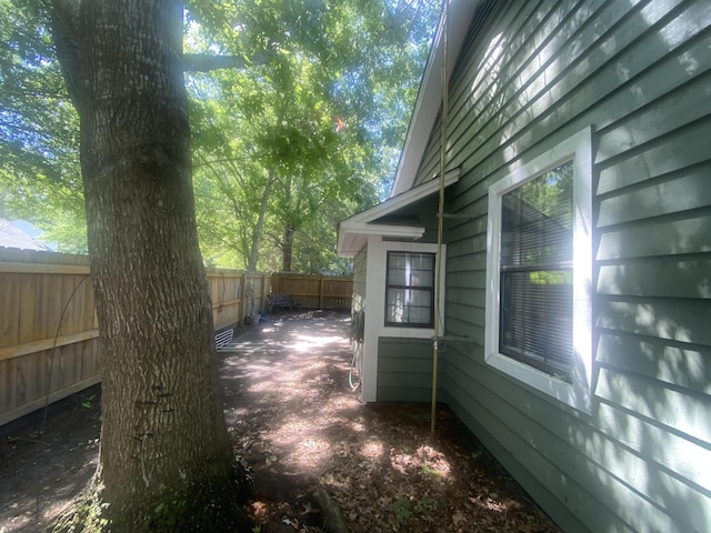 8254 Timberidge Ct, North Charleston, SC 29420 - view of side of home with a fenced backyard