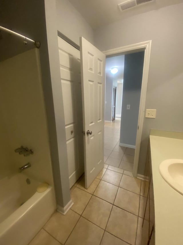 8254 Timberidge Ct, North Charleston, SC 29420 - bathroom featuring tile patterned flooring, vanity, and shower / tub combination