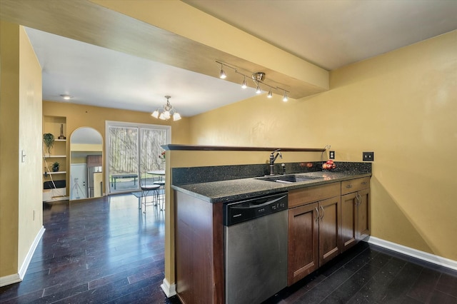 kitchen featuring dark wood-style floors, baseboards, a peninsula, a sink, and stainless steel dishwasher