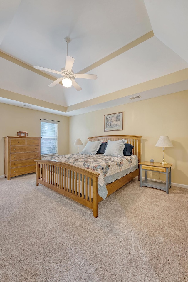 bedroom featuring carpet floors, a ceiling fan, and baseboards