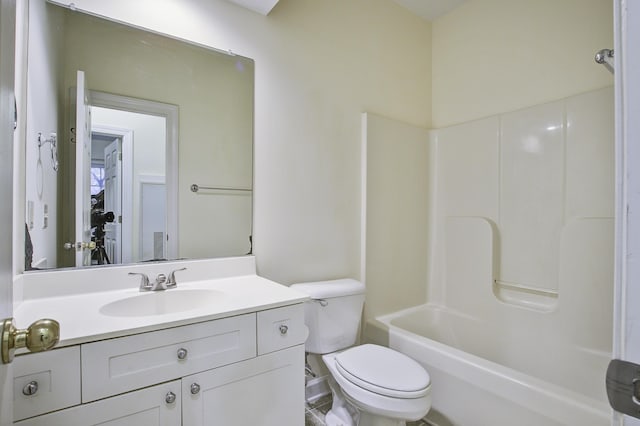 full bathroom with bathtub / shower combination, vanity, and toilet