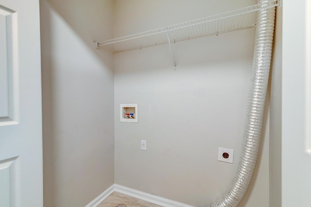 laundry area with washer hookup, laundry area, hookup for an electric dryer, and baseboards