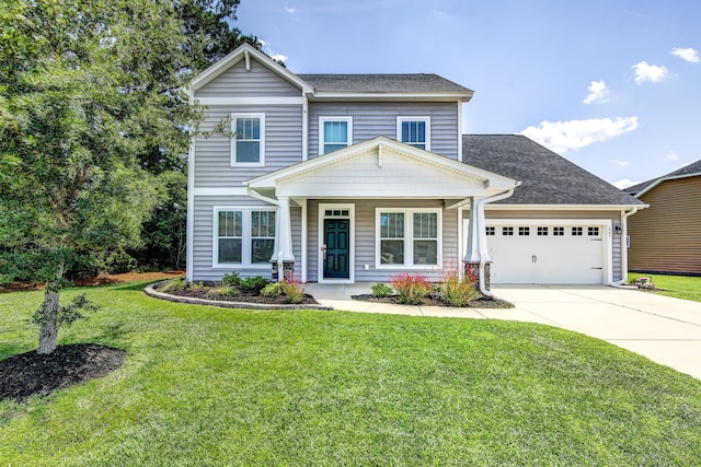 243 Topsaw Ln, Moncks Corner, SC 29461 - traditional-style home with concrete driveway, a front yard, a garage, and covered porch