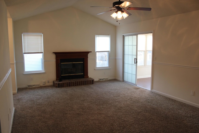 unfurnished living room featuring lofted ceiling, carpet flooring, and ceiling fan