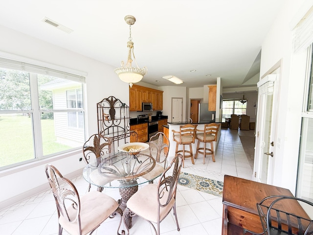 1804 Bass Rd, Moncks Corner, SC 29461 - dining area with light tile patterned floors and recessed lighting