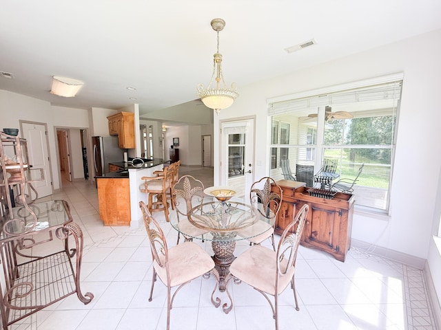 1804 Bass Rd, Moncks Corner, SC 29461 - dining area featuring light tile patterned floors and baseboards