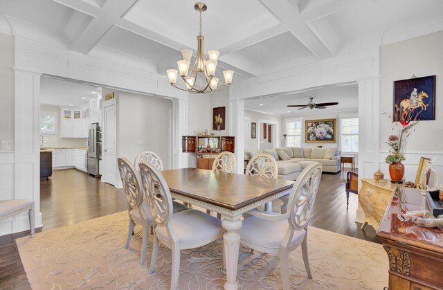 828 Bridge Point Cir, Mount Pleasant, SC 29464 - dining area with a chandelier, coffered ceiling, dark wood-type flooring, ceiling fan, and beam ceiling