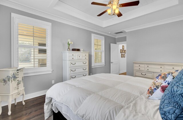 828 Bridge Point Cir, Mount Pleasant, SC 29464 - bedroom with wood finished floors, multiple windows, baseboards, and a tray ceiling