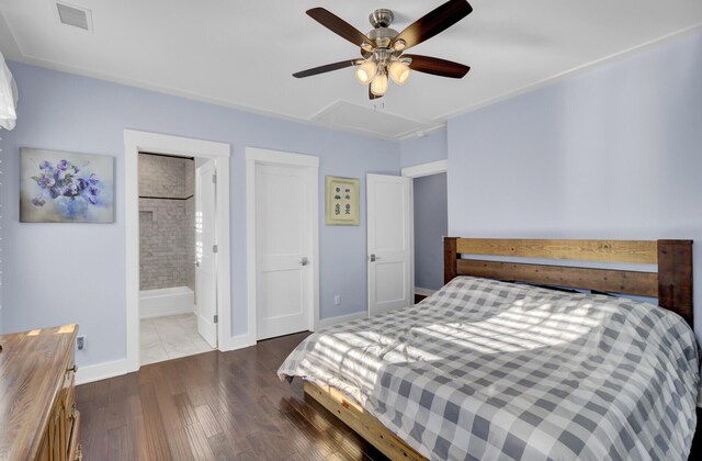 828 Bridge Point Cir, Mount Pleasant, SC 29464 - bedroom with attic access, dark wood finished floors, baseboards, ceiling fan, and connected bathroom