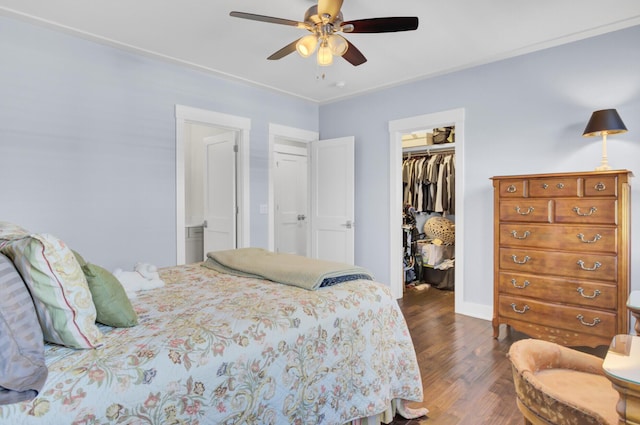 828 Bridge Point Cir, Mount Pleasant, SC 29464 - bedroom with dark wood-style floors, a spacious closet, a closet, and ceiling fan